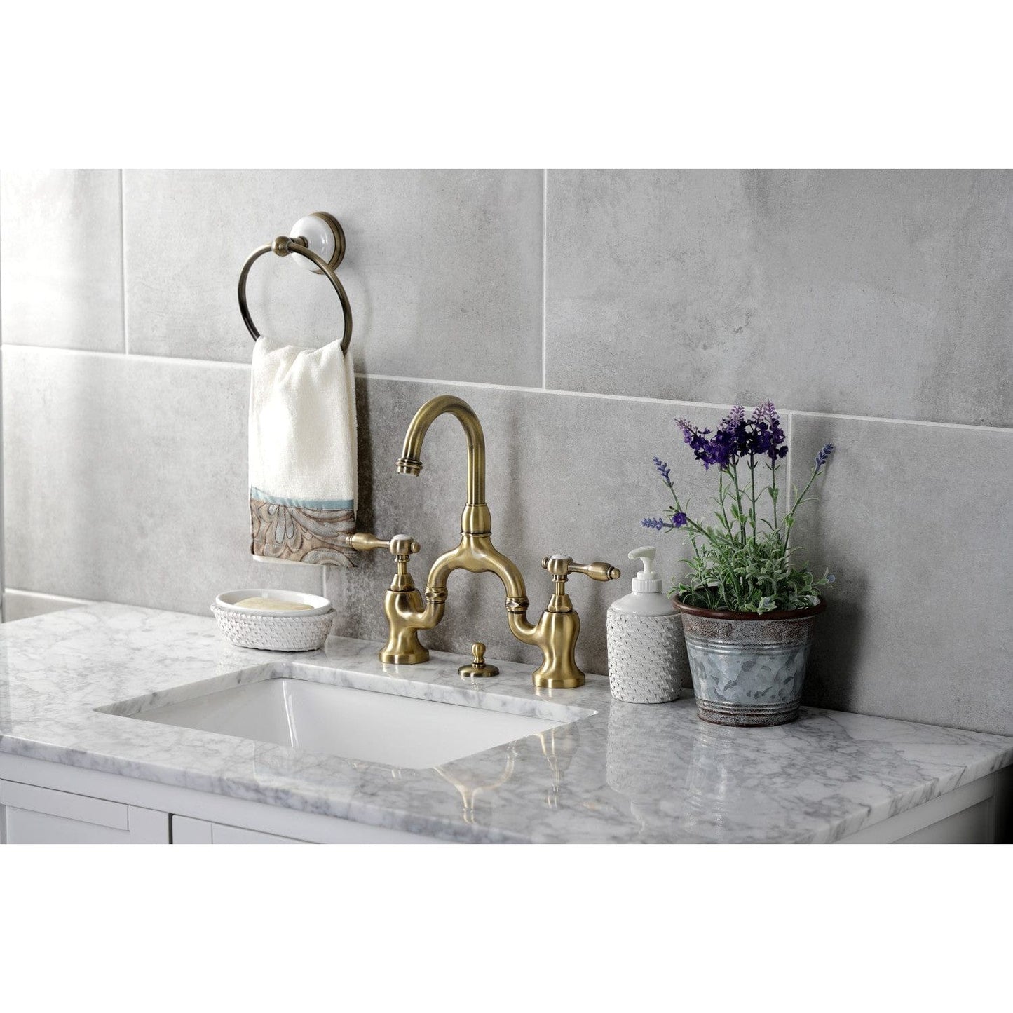 Kingston Brass Kingston Brass Tudor Bridge Bathroom Faucet with Brass Pop-Up, Antique Brass KS7993TAL